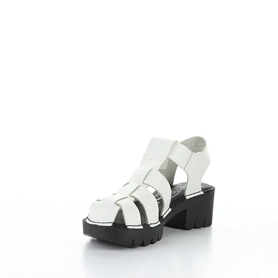 White sandal with black sole on a white background