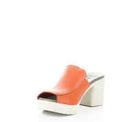 Orange sandal with a white sole on a white background