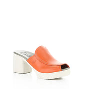 Orange slip on sandal with a white sole on a white background