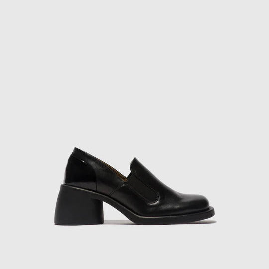 Black leather shoe on a light gray background