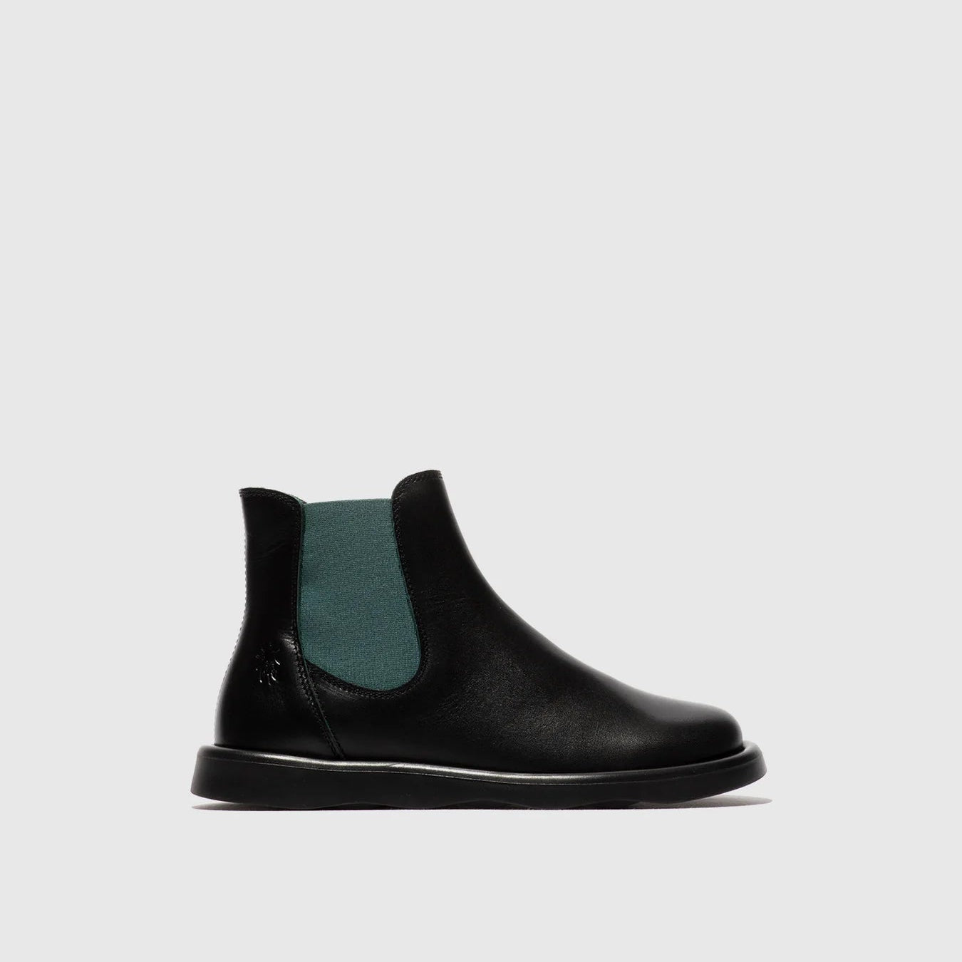 Black Chelsea boot with green inner lining on a light gray background