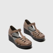 Pair of taupe sandals with wedge sole