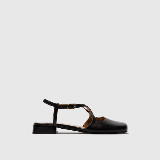 Black slingback with a thin strap on a light gray background