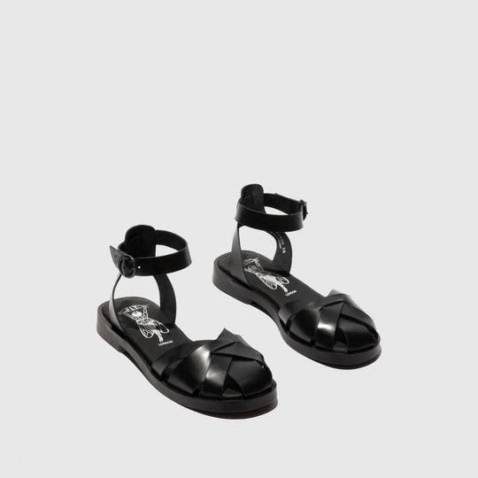Pair of black sandals on a light gray background