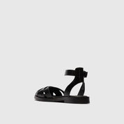 Black sandal on a light gray background