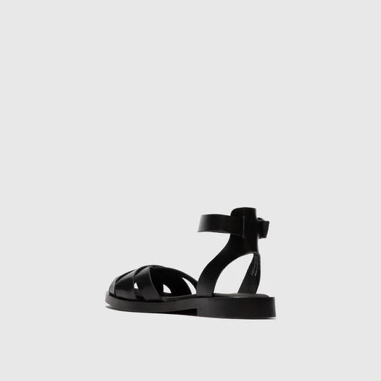 Black sandal on a light gray background
