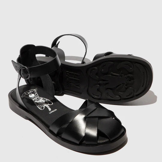 Black sandals with a brand logo on a light gray background