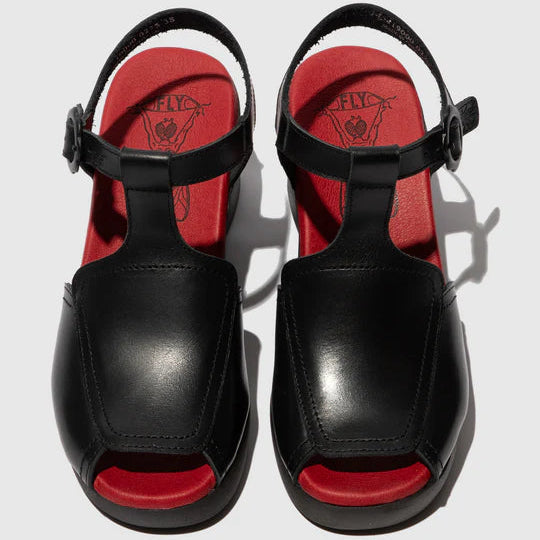 Black sandals with red soles on a white background
