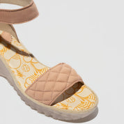 Pink Suede wedge sandal with quilted design
