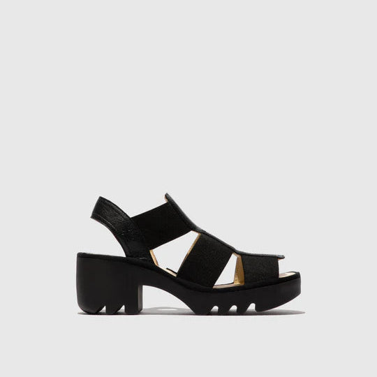 Black sandal on a light gray background