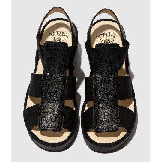 Black wedge sandals on a white background