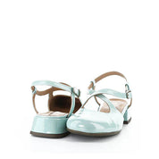Pair of light blue sandals on a white background