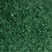 Close-up of dark green textured fabric