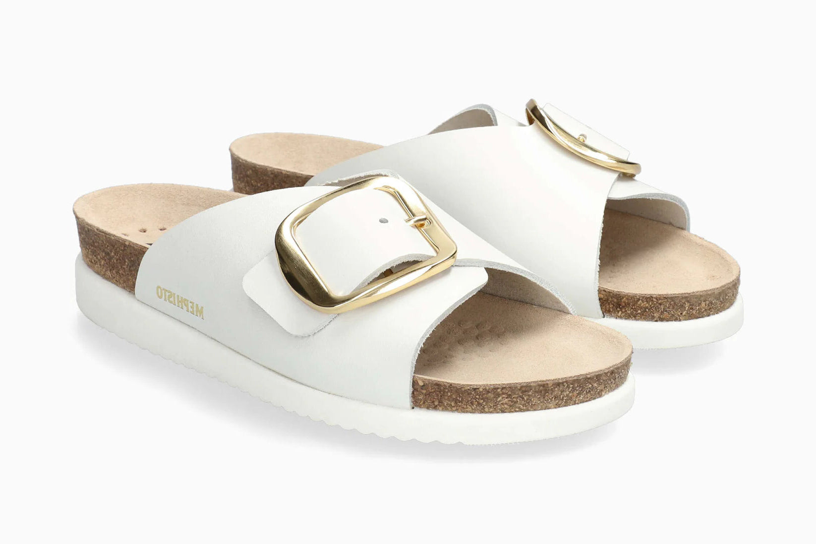White sandals with gold buckles on a white background