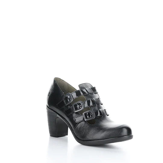 Black leather shoe with buckle details on a white background