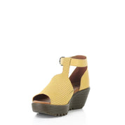 Yellow wedge sandal on a white background