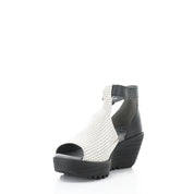 Black and white wedge sandal on a white background