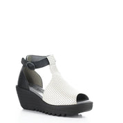 Black and white wedge sandal on a white background