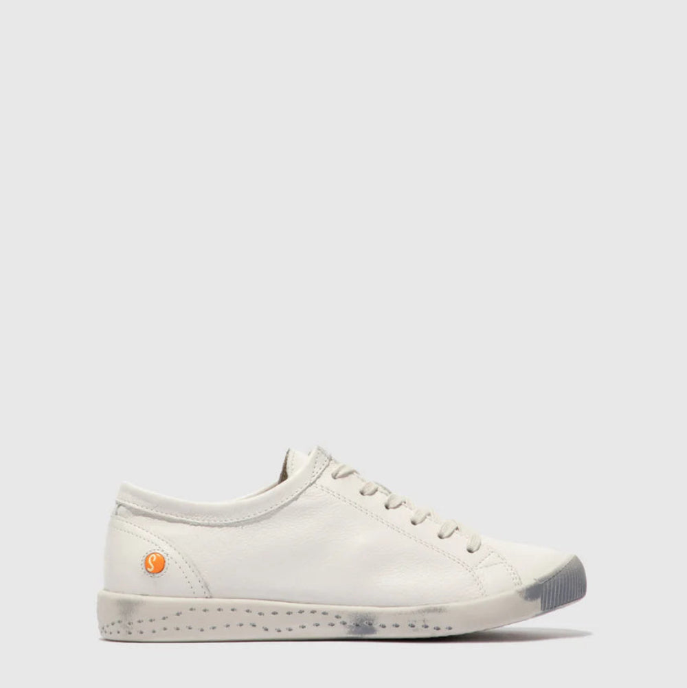 White sneaker with a small orange tag on a light gray background