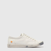 White sneaker with a small orange tag on a light gray background