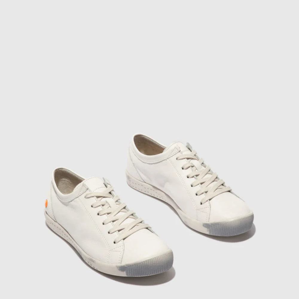 Pair of white sneakers on a light gray background