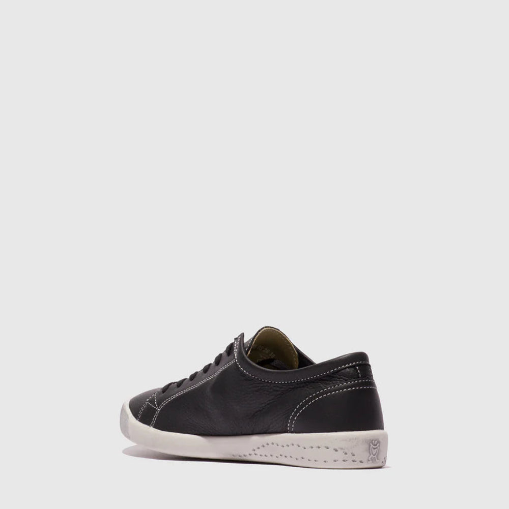 black sneakers on a light gray background