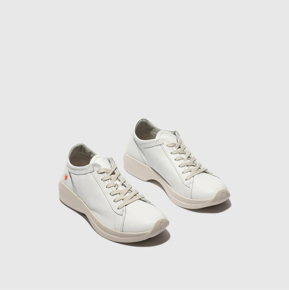 Pair of white sneakers on a light gray background