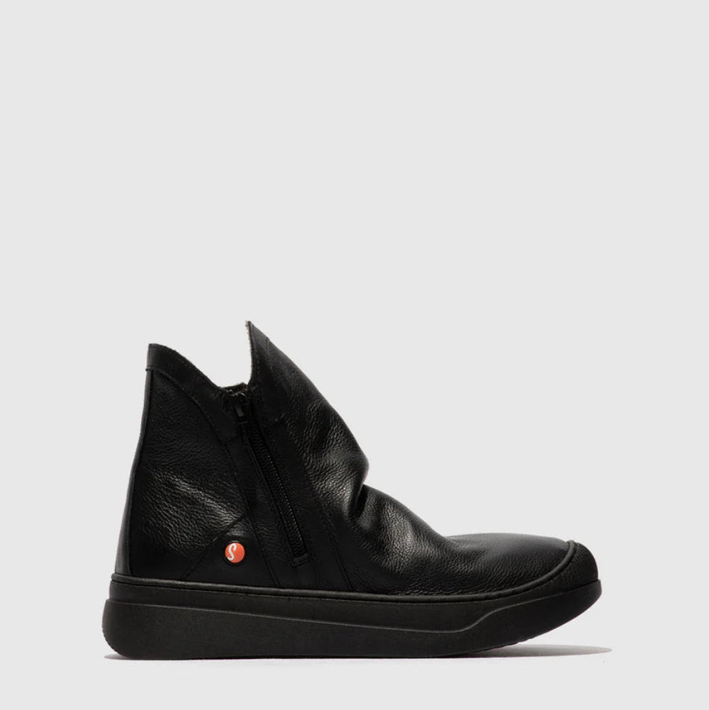 Black leather boot with a black sole on a white background
