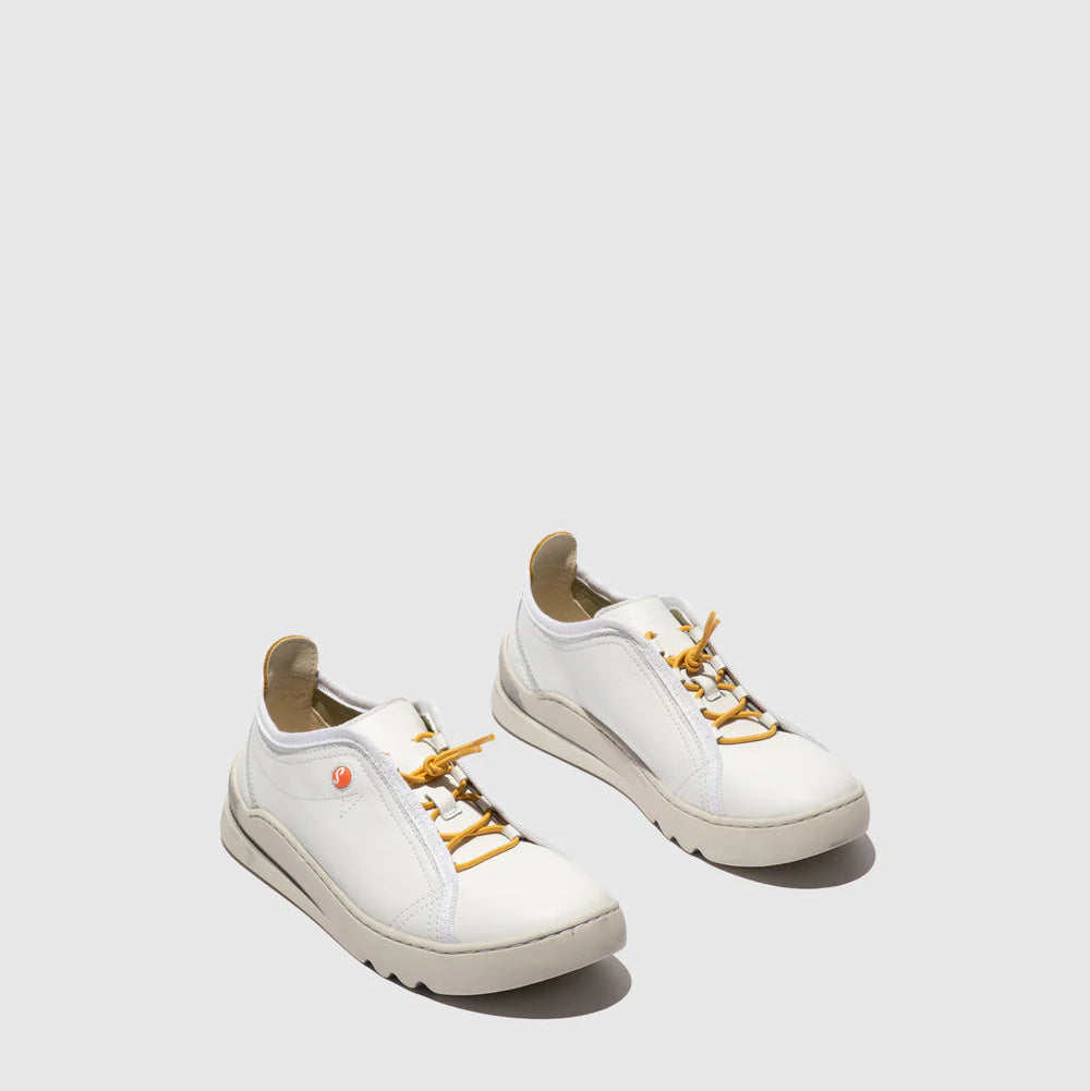 Pair of white sneakers with gold accents on a light gray background