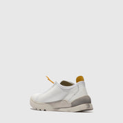 White sneaker with gray sole on a white background