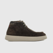 A dark brown suede ankle boot with a thick beige sole, shown in a side profile against a light gray background.
