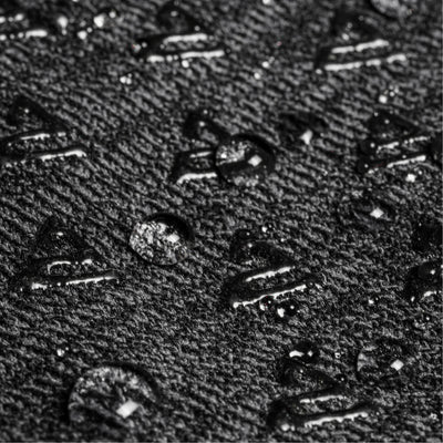 Close-up of textured grey surface with small raised elements