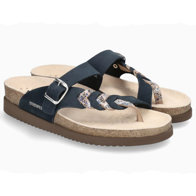 Pair of navy sandals with floral straps on a white background