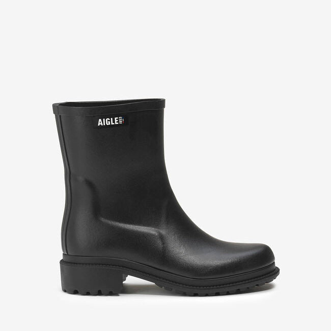 Black rain boot with Aigle logo on a white background
