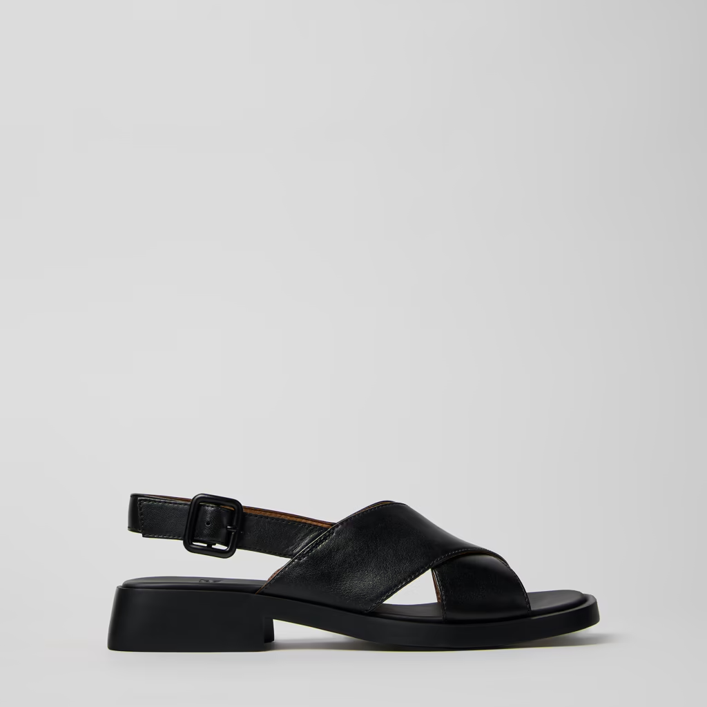 Black sandal on a light gray background