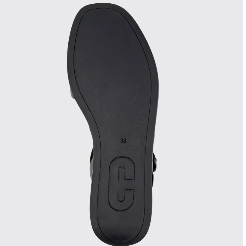 Black sandal sole on a light gray background