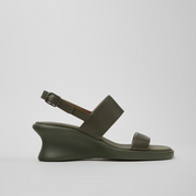 Green wedge sandal on a light gray background