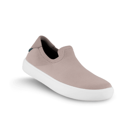 Mauve slip-on shoe with white sole on a white background