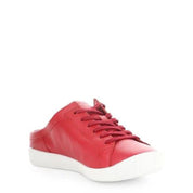 Red sneaker with white sole on a light beige background