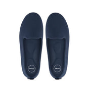 Pair of navy blue slippers with 'Vessi' branding on a white background